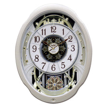 Load image into Gallery viewer, Moving Face Pendulum Wall Clock - Plays Melodies Every Hour