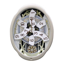 Load image into Gallery viewer, Moving Face Pendulum Wall Clock - Plays Melodies Every Hour