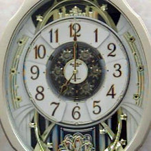 Load image into Gallery viewer, Moving Face Pendulum Wall Clock - Plays Melodies Every Hour
